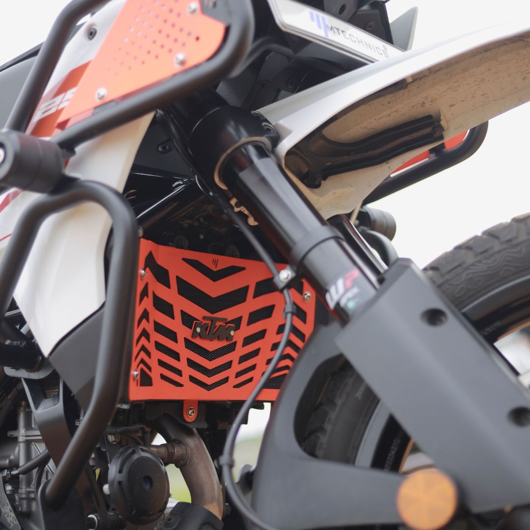 2025 ADV 250/390 RADIATOR GUARD ORANGE