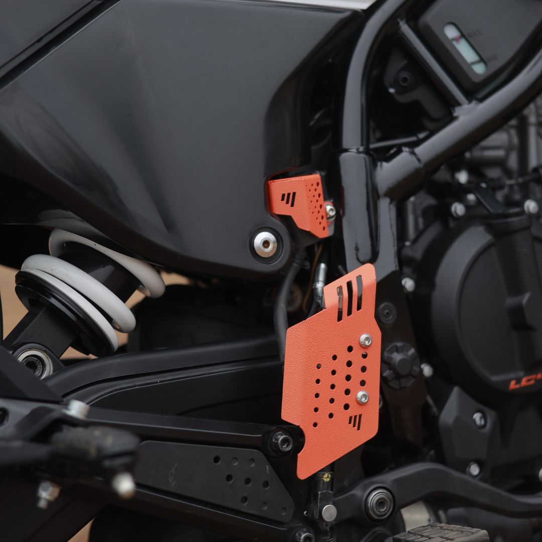 2025 ADV 250//390 REAR DISC OIL GUARD  ORANGE 
