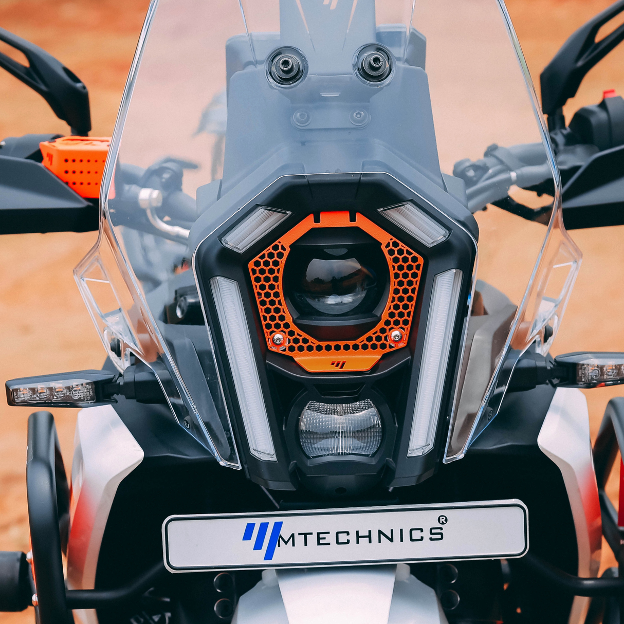 ADV 2025 250/390 HEADLIGHTGRILL ORANGE